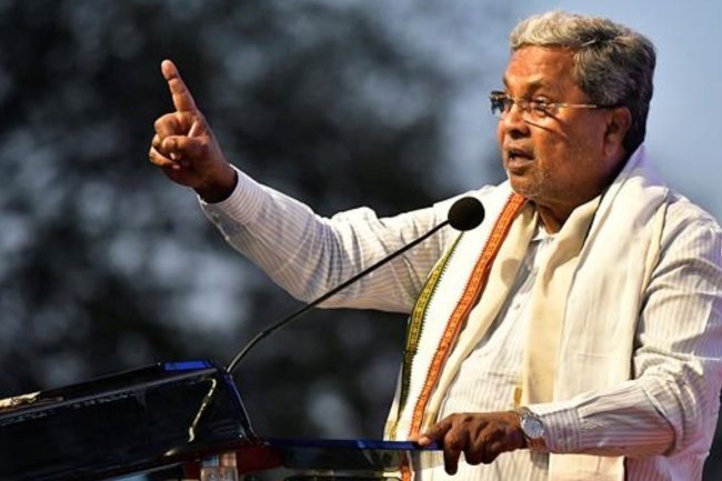 Siddaramaiah Takes Jibe at PM Modi Over 'God Sent' Remark - Shocking!