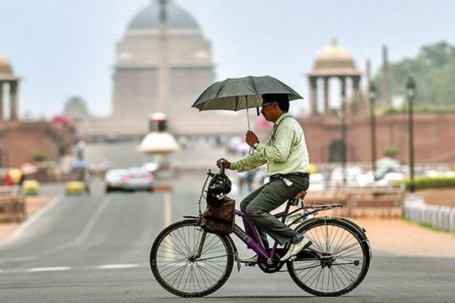 Delhi Swelters Under Record 52.3°C Heat: Breaking All-Time High!