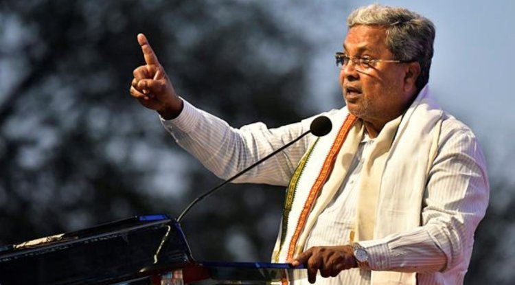 Siddaramaiah Takes Jibe at PM Modi Over 'God Sent' Remark - Shocking!