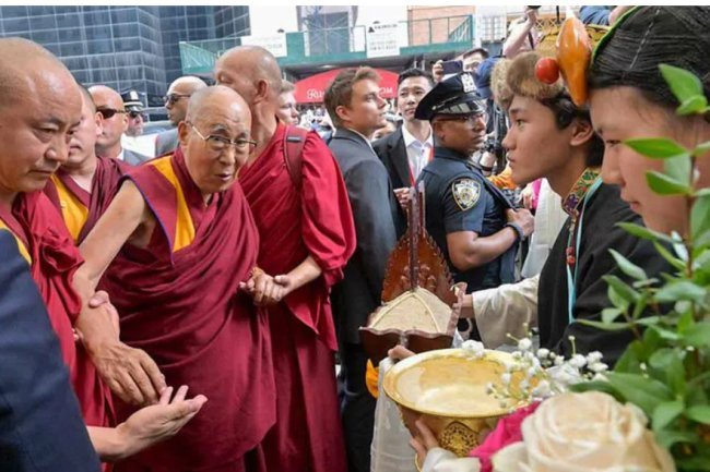 Arriving in New York for knee surgery is the Dalai Lama