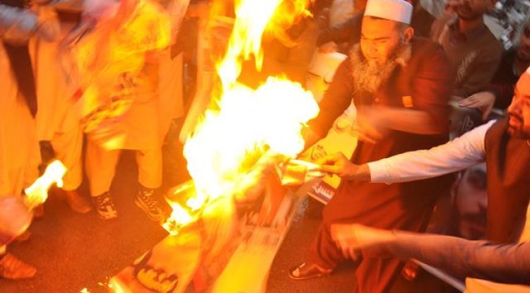 Man is hanged by a mob in Pakistan for 'desecrating' the Quran: