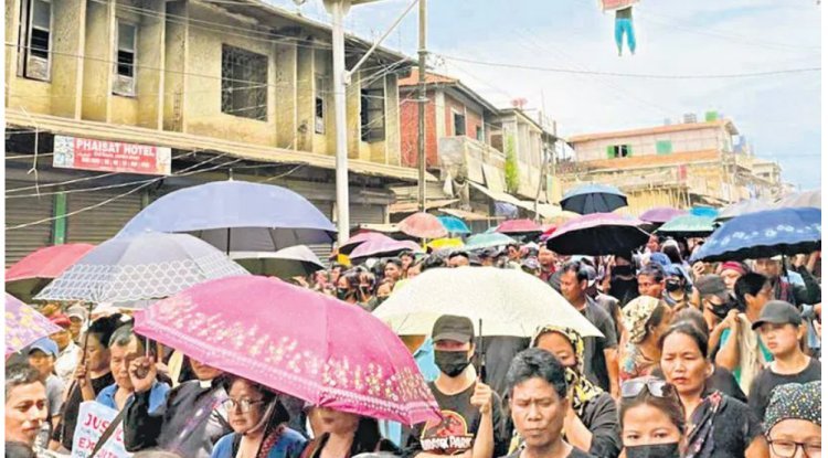 Thousands protest in Manipur for state integrity amid conflict.