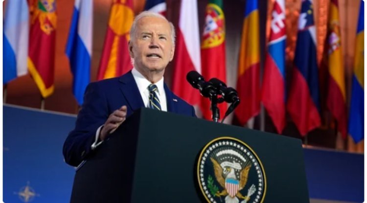 Biden reads from teleprompters at NATO summit speech.