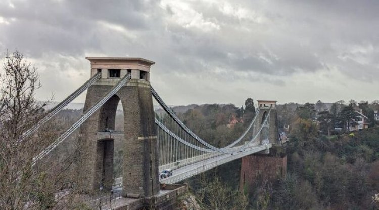 Two men's bodies found in suitcases on a UK bridge; the 24-year-old was arrested