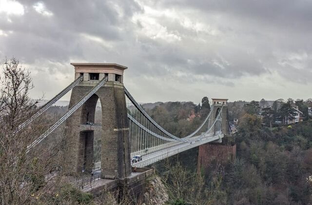 Two men's bodies found in suitcases on a UK bridge; the 24-year-old was arrested