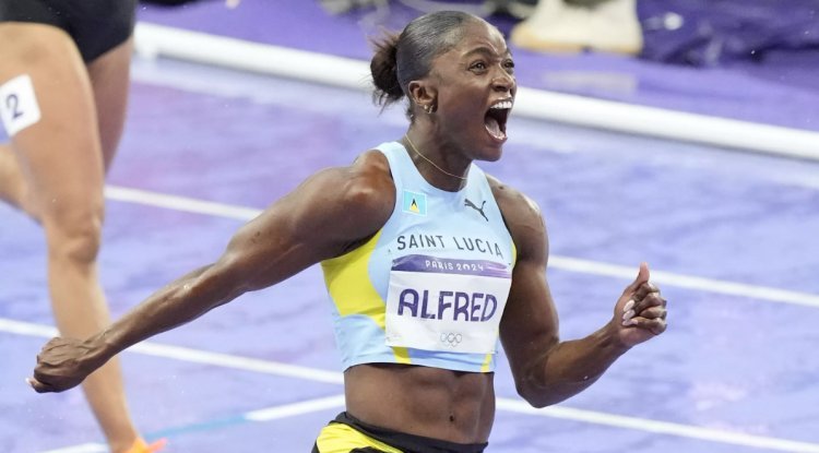 Julien Alfred earns St. Lucia's first Olympic medal in the 100 meters.