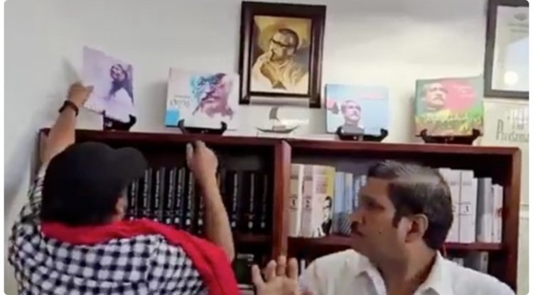 Khaleda Zia supporters in NY remove Sheikh Mujibur's image.